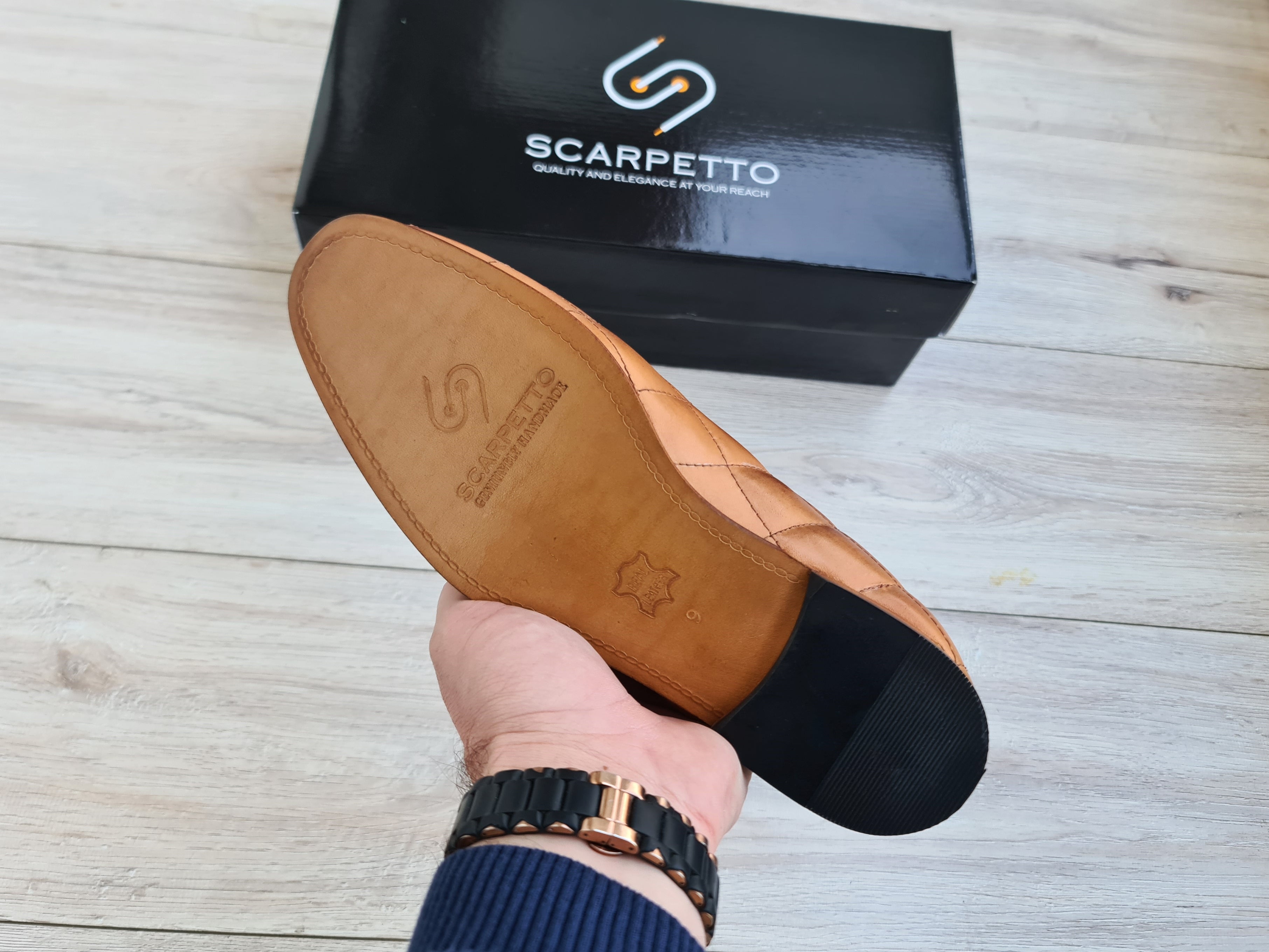 Quilted Tassel Men's Leather Loafer — three-quarter view | Scarpetto