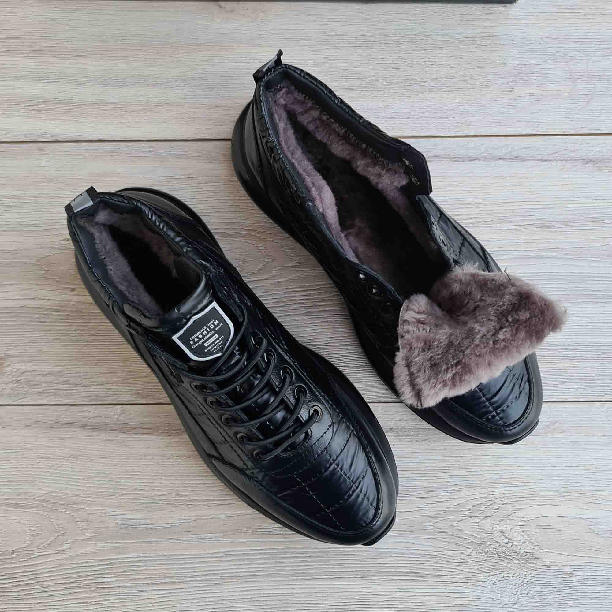 Activo Fur-Lined Black Leather Sneaker — top view | Scarpetto