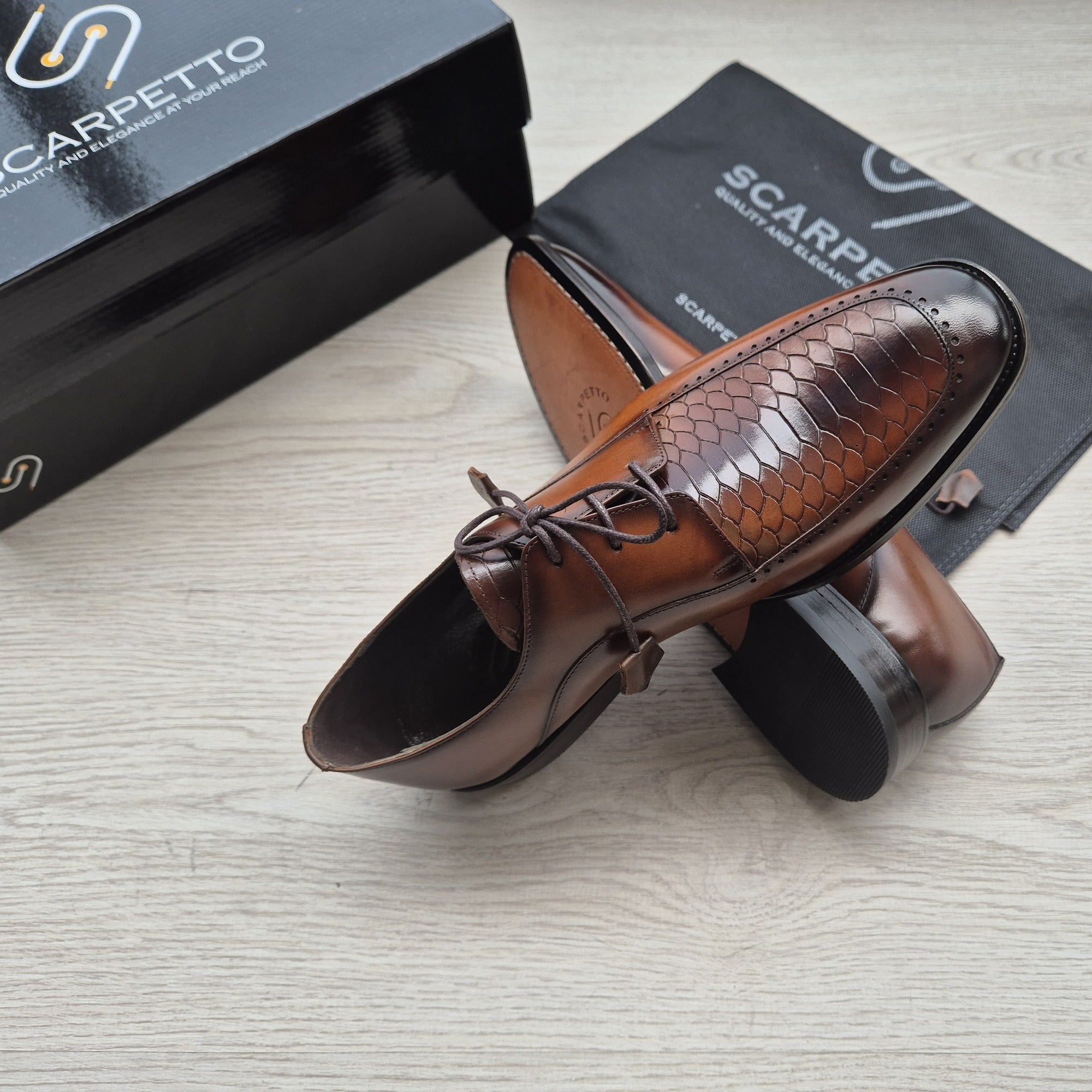 Leonardo Mahogany Textured Wingtip Derby - three-quarter view