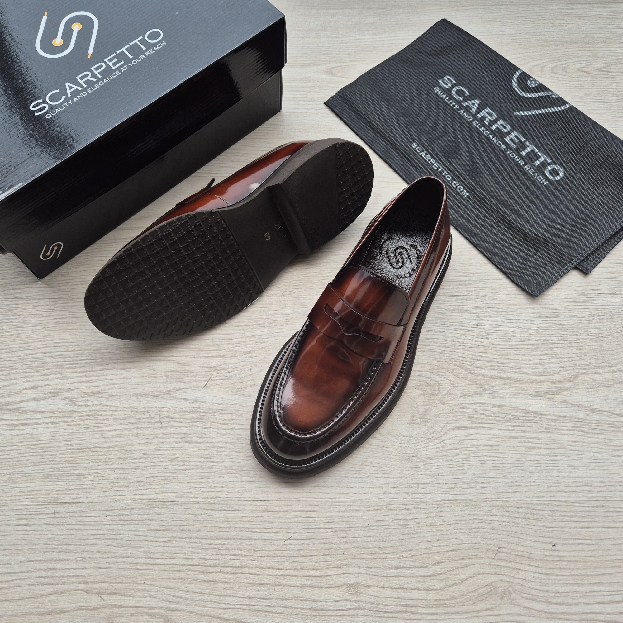 Napoli Oxblood Patent Penny Loafer - three-quarter view