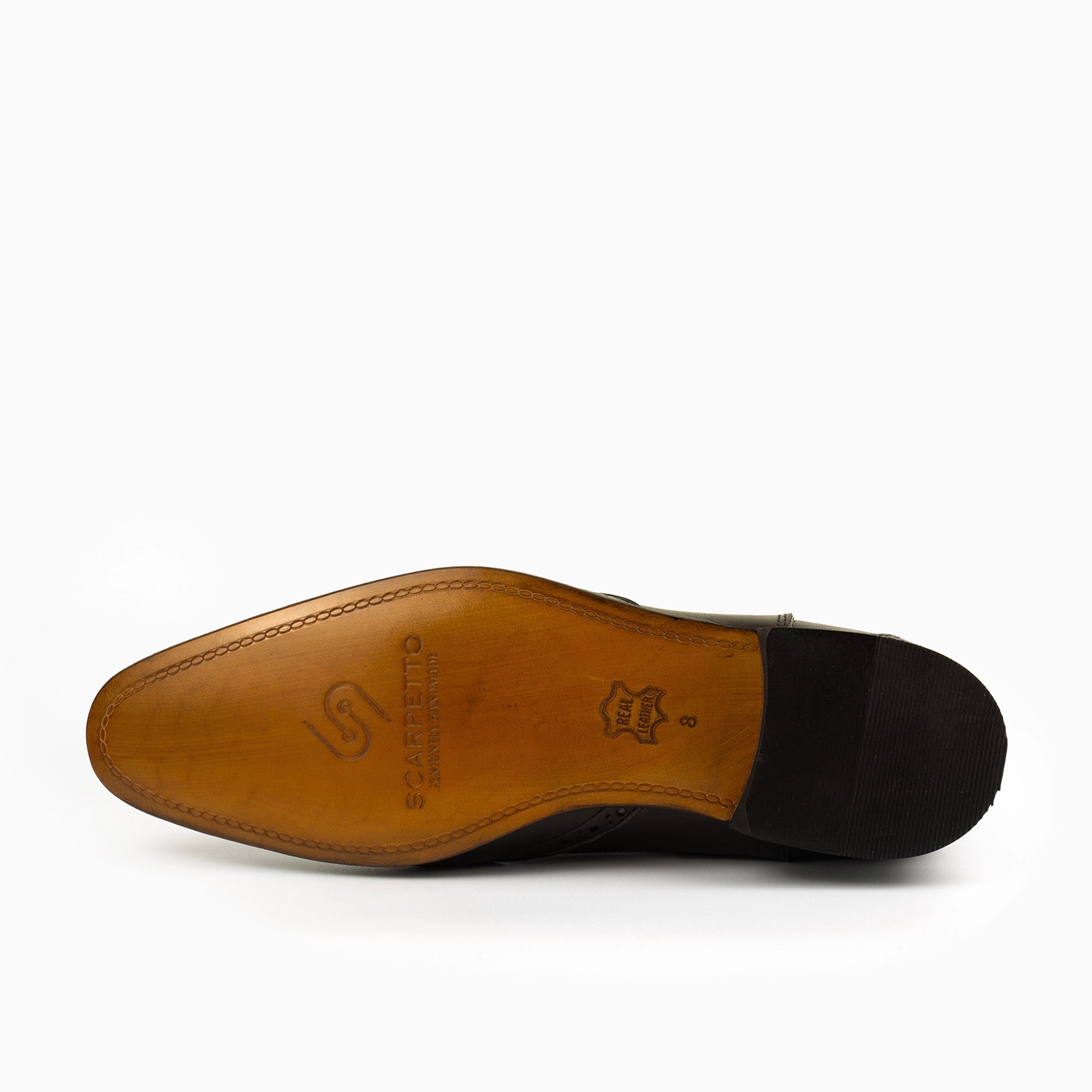 Milano Black Wingtip Chelsea Boots for Men — sole detail | Scarpetto