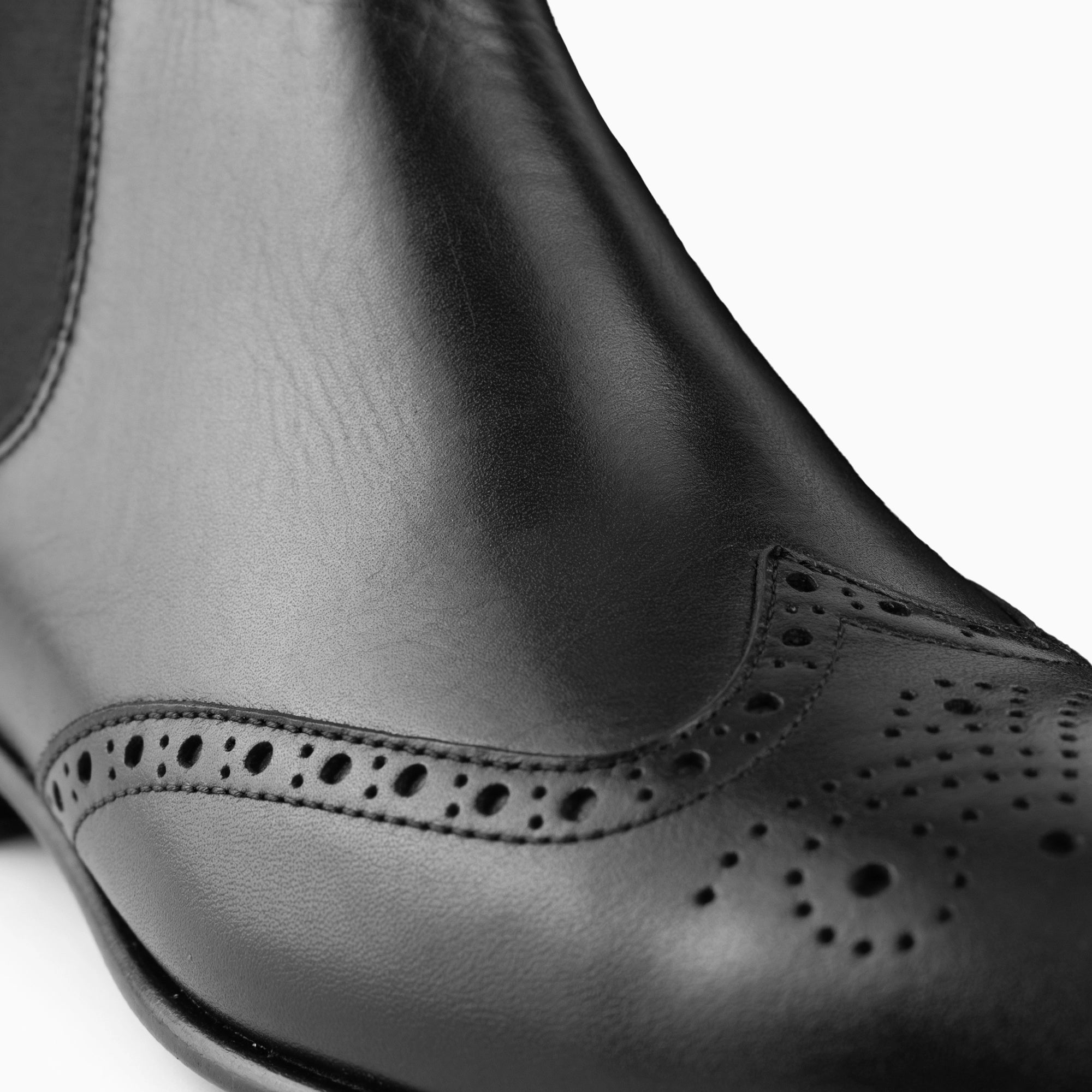 Milano Black Wingtip Chelsea Boots for Men — heel detail | Scarpetto