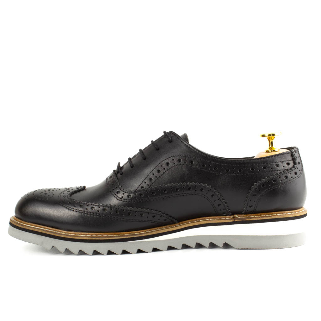 Vestito Black Wingtip Leather Oxford for Men — sole detail | Scarpetto