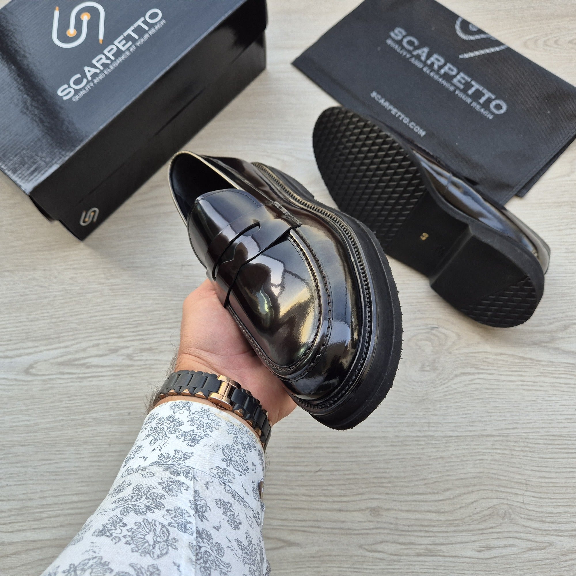 Napoli Jet Black Patent Penny Loafer — three-quarter view | Scarpetto
