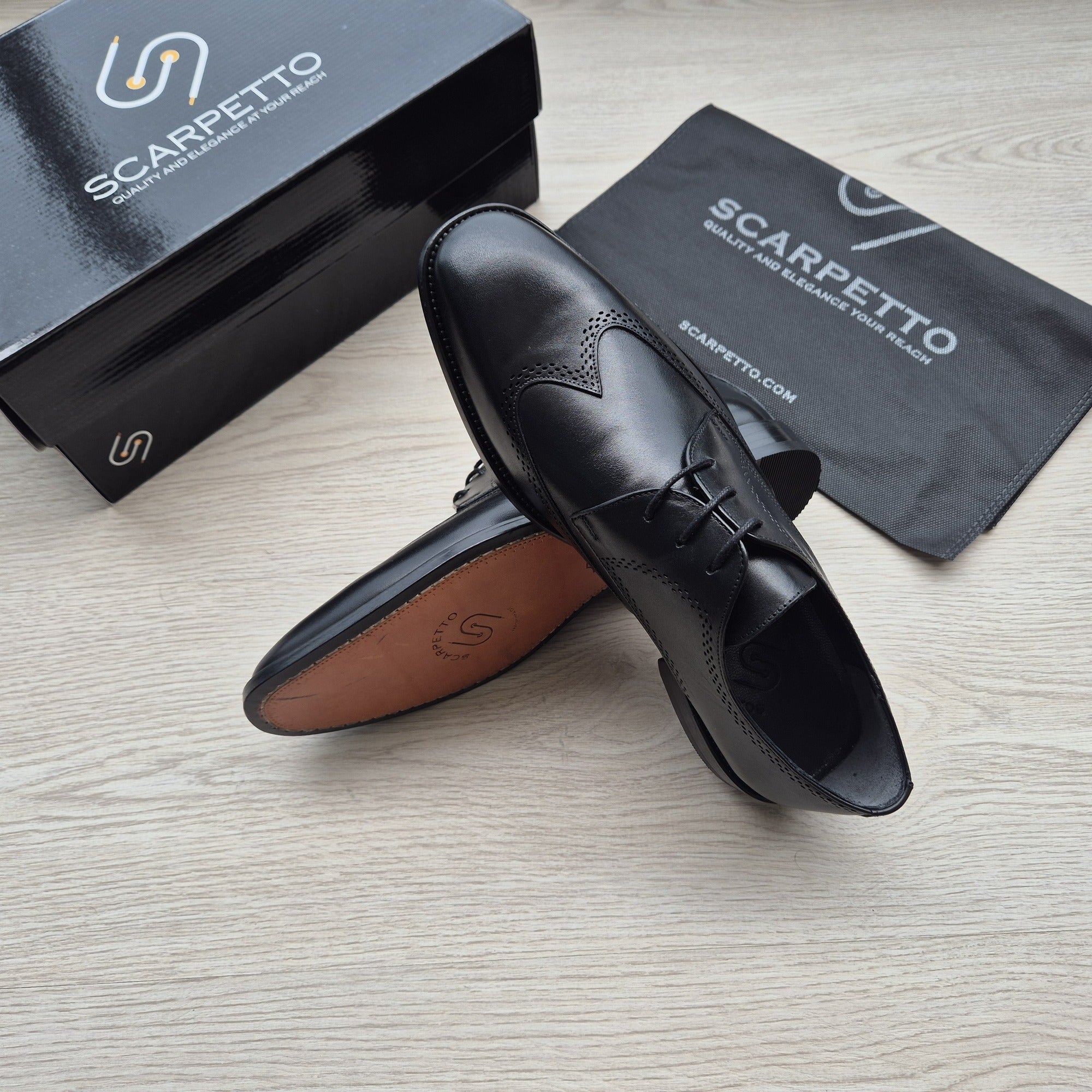 Rinaldo Jet Black Wingtip Brogue Derby — sole detail | Scarpetto